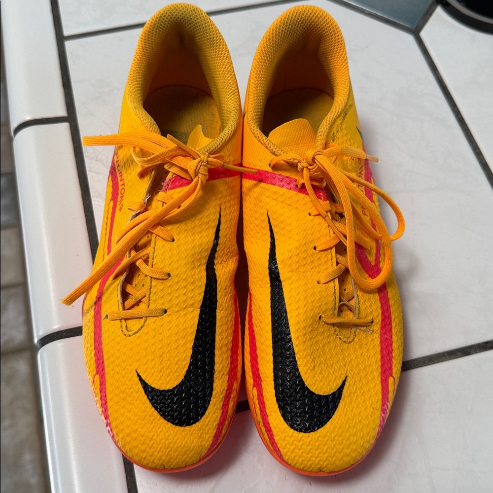 Nike Phantom Cleats in Yellow and orange
